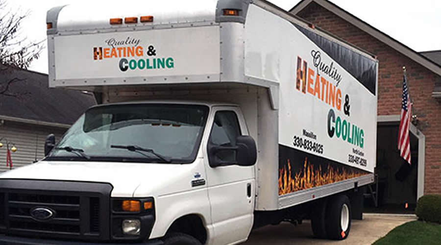 Quality Heating And Cooling Van In Driveway